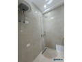 jepet-me-qera-apartament-11-tek-tirana-garden-building-small-1